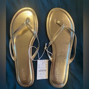 Never worn gold metallic flip flops